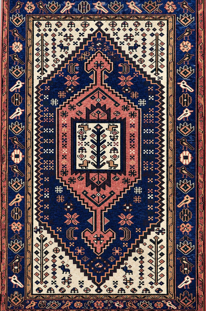 A traditional oriental-style Heriz area rug with a complex geometric and floral pattern. The design features a large central medallion in dusty pink and cream, surrounded by a deep navy blue field, and a wide patterned border in dark blue, rust red, and cream.