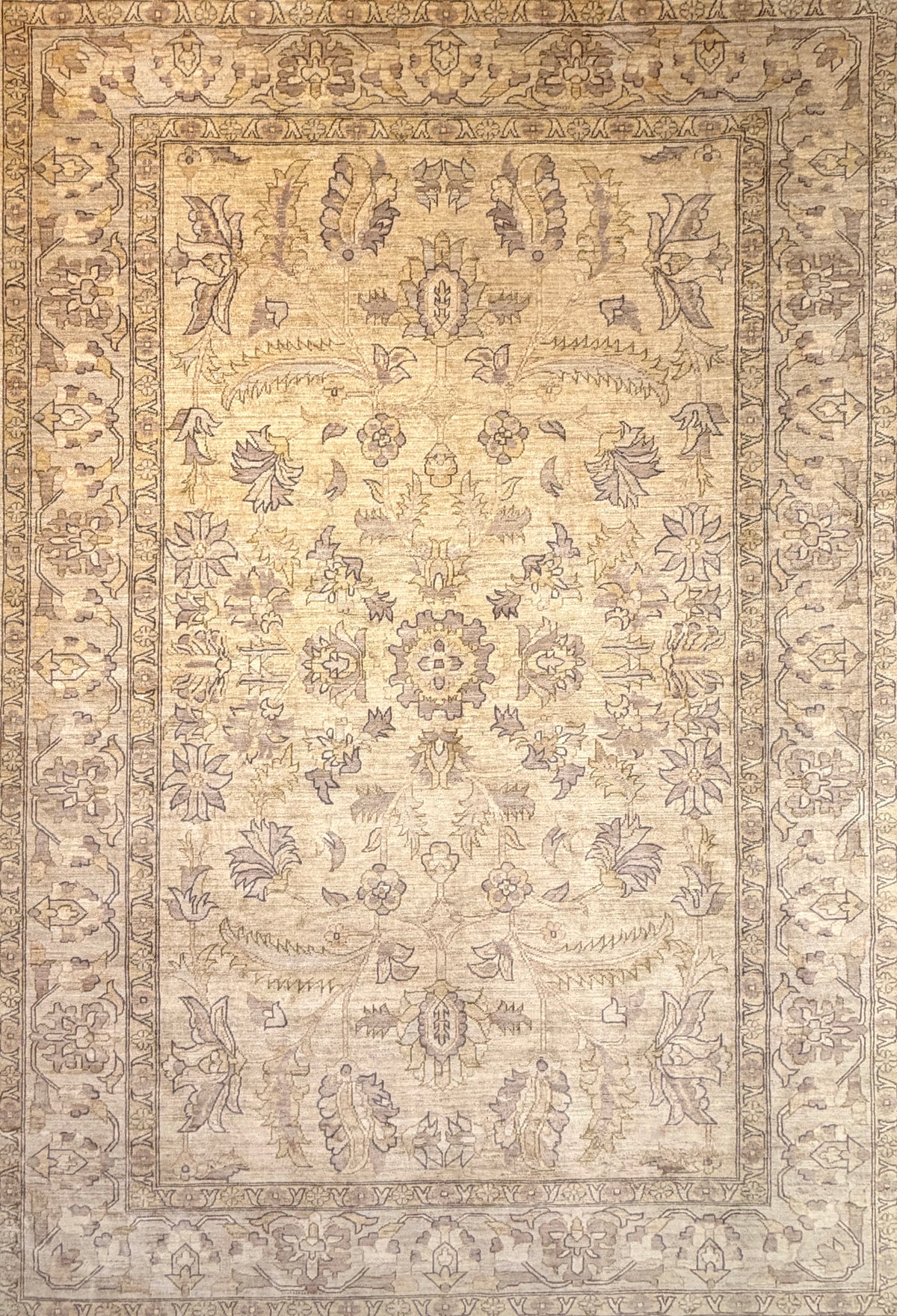Hand-Knotted Agra Rug, 6’x9’: Beige with floral and geometric designs in muted brown and gold tones.