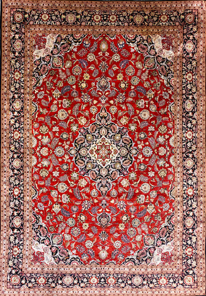Hand-knotted 100% silk Persian Kashan rug, 6′10″x9′9″, with intricate red, cream & navy floral patterns.