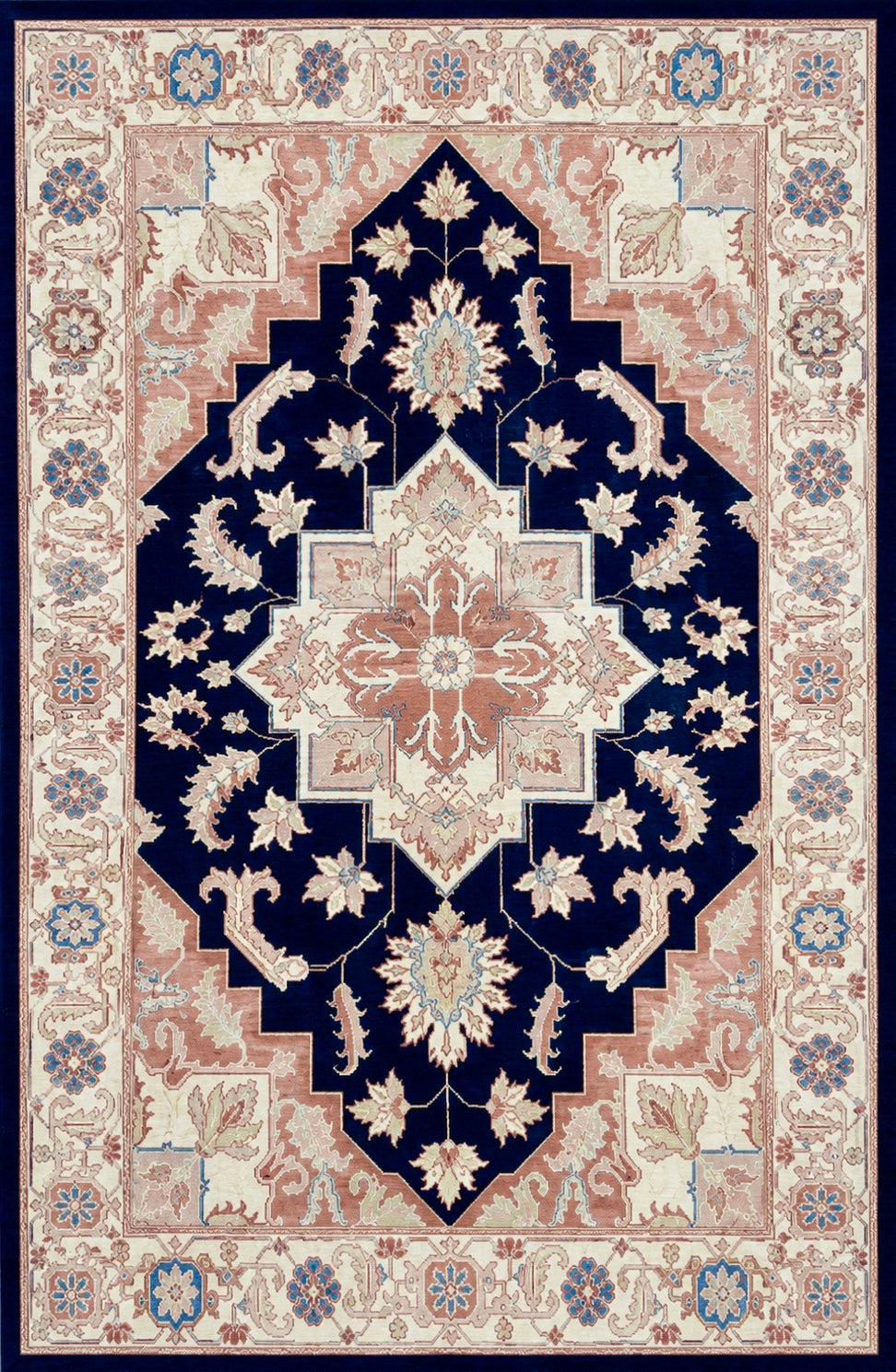 A traditional oriental-style area rug with a dark navy blue central field, cream and beige floral motifs, and a dusty pink border.