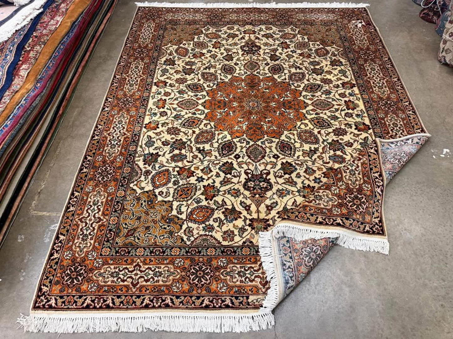 7’10”x9’10” Handmade Tabriz Rug- Signed